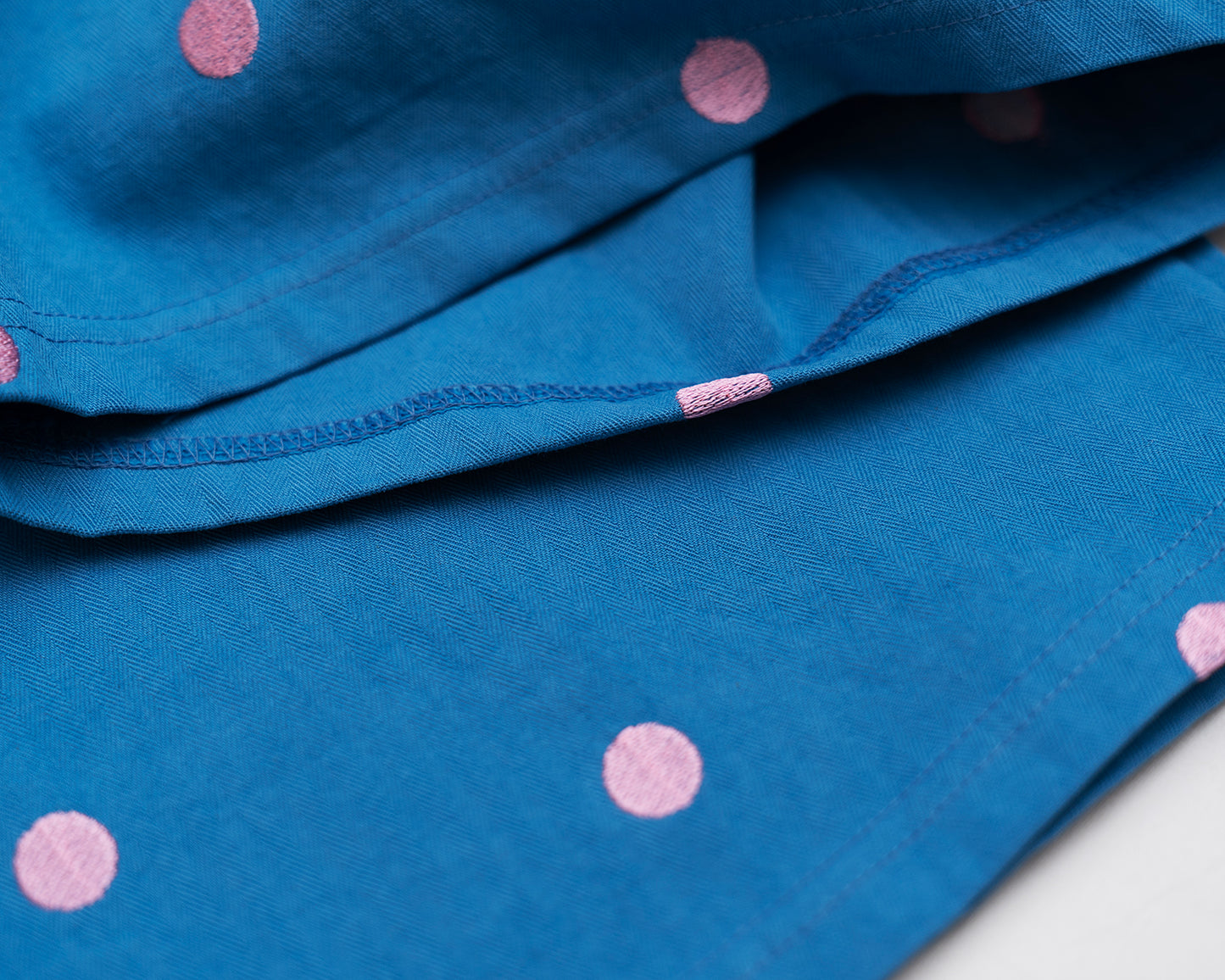 Pantalone con Bolli Ricamati